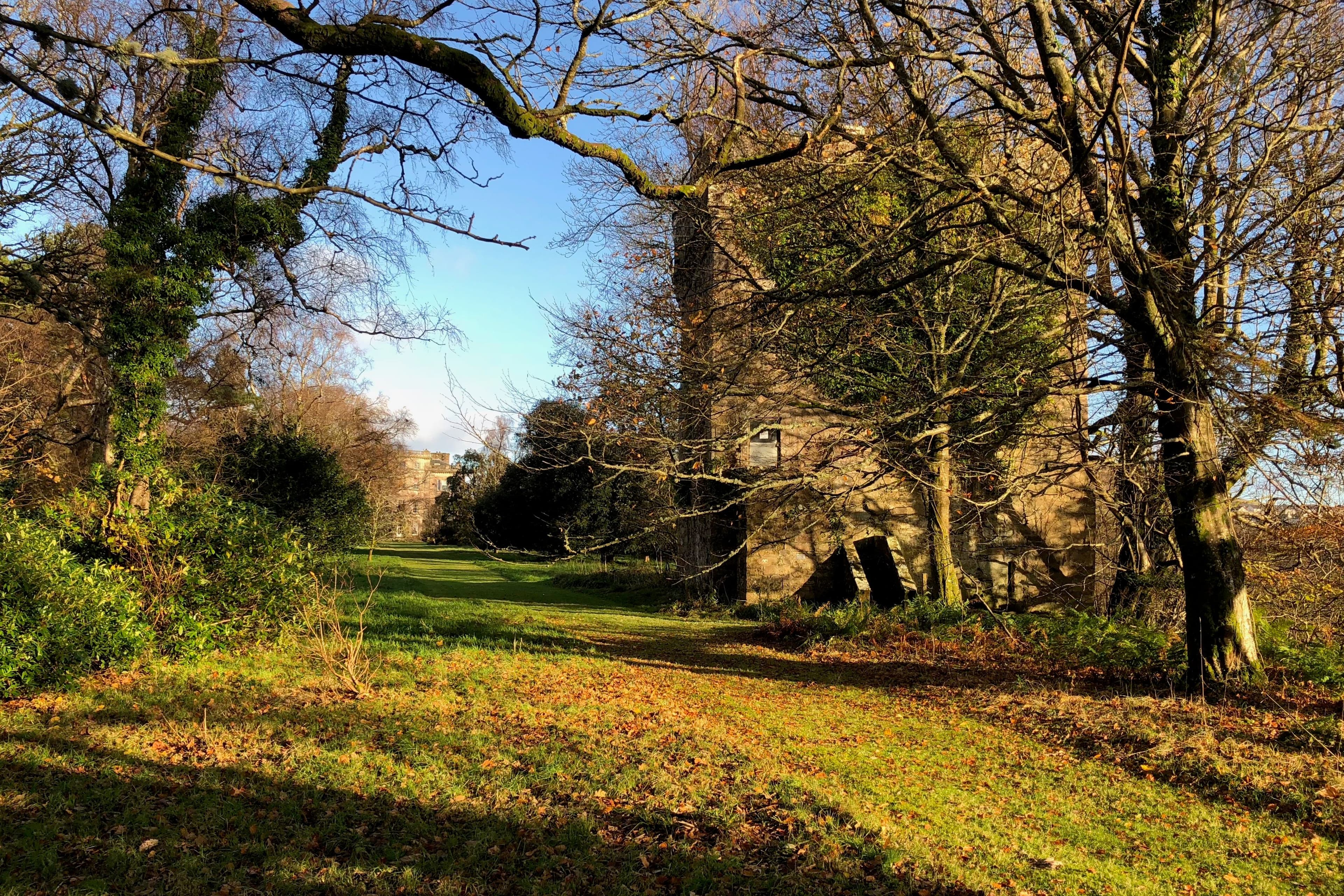 Ardgowan Castle, a 15th century tower house, to the right of the lawn leading up to Ardgowan House. It is near Inverkip in Scotland, looking over the Firth of Clyde, and was built on the site of the earlier fortress of Inverkip Castle dating from before the 13th century.