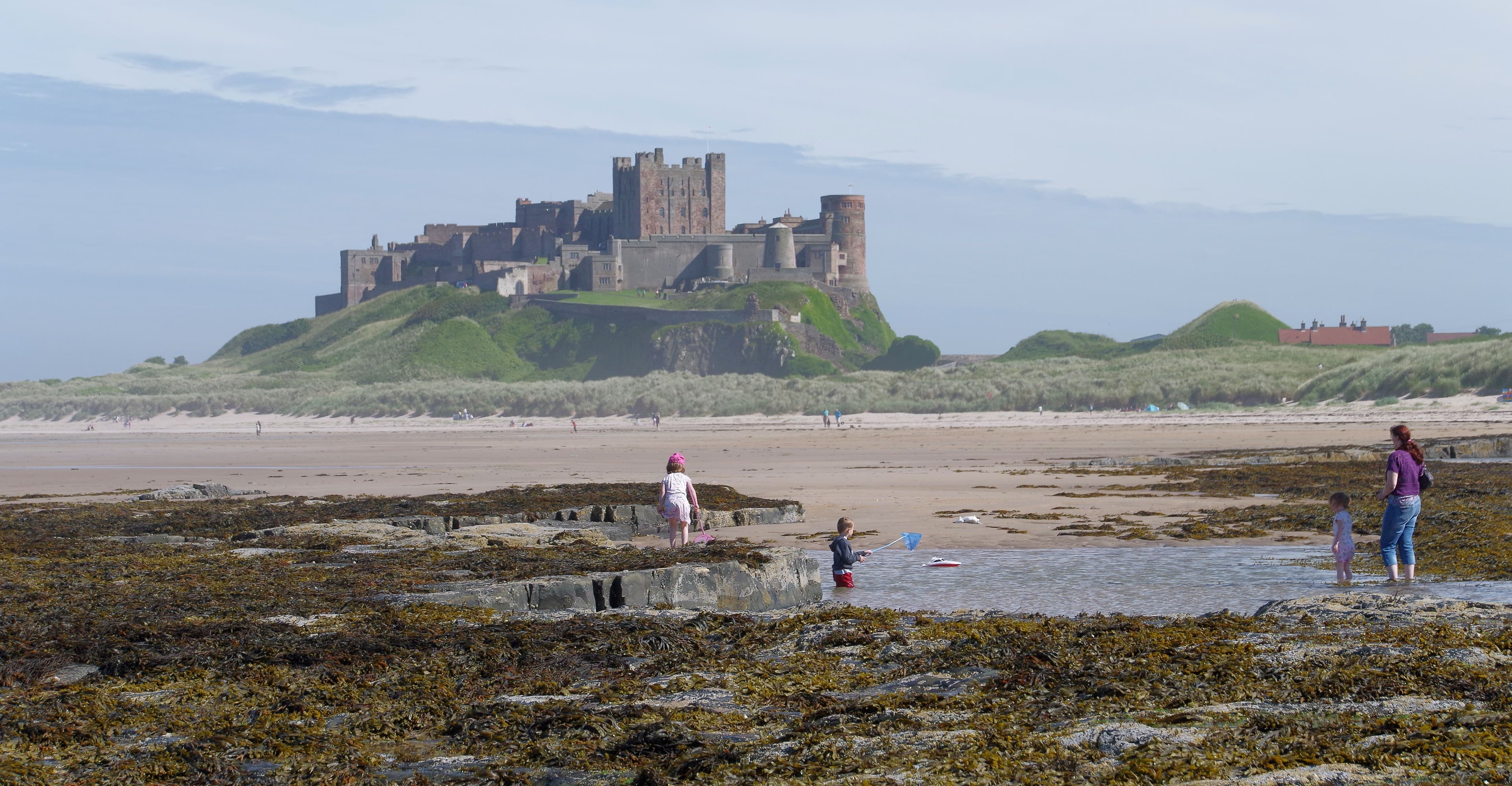 Bamburgh Castle, seen from the beach to the north.