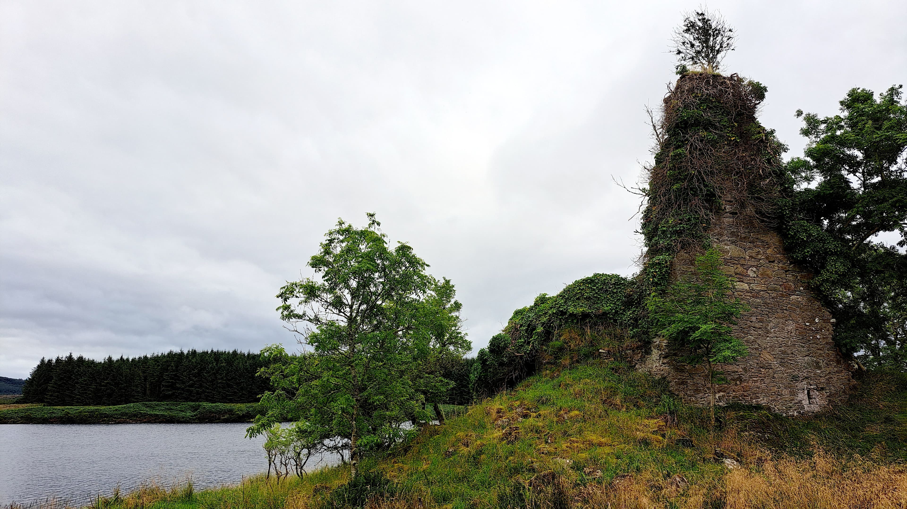The ruins of Asgog Castle on the shore of Asgog Loch in Argyll and Bute, Scotland